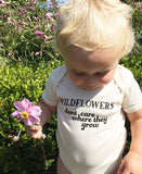 WILDFLOWERS DON'T CARE WHERE THEY GROW